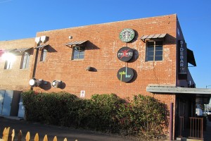 The old Emerald Lounge building now houses SideBar, Starbucks and Pei Wei.
